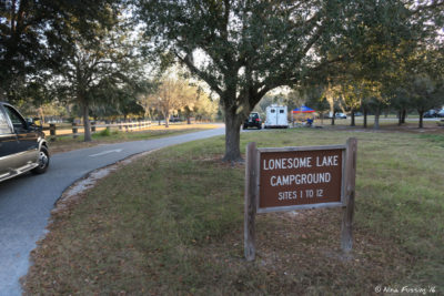 Entrance to southern camping loop (Lonesone Lake) sites #1-12. Pull-through #1 on immediate right in back.