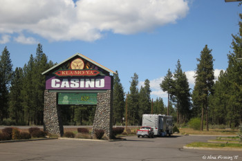 An RV parked on the perimeter of the lot