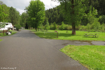 View from near entrance. Emtpy site on right #5. Camphost is on left. We're in far back #15.