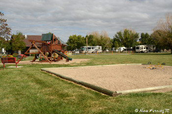 Playground area with sand box for the kids.