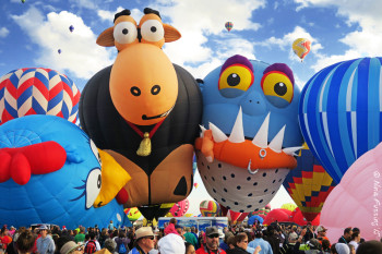 Balloons so crowded they kiss