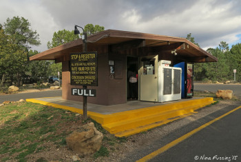 View of entrance & registration office. The free rim shuttle bus stop is just to the left of this.