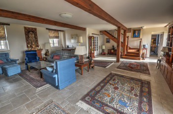 Downstairs living room with original beams