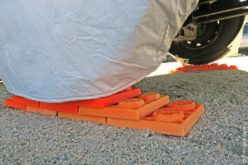 We keep using & abusing 'em and they keep holding! Here we're piled 3-high under our wheels.