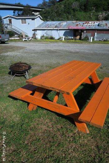 View of picnic table and moveable fire-pit. Only a few of these around.