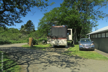 Our parking spot at Cape D. Camp toilets to the right.