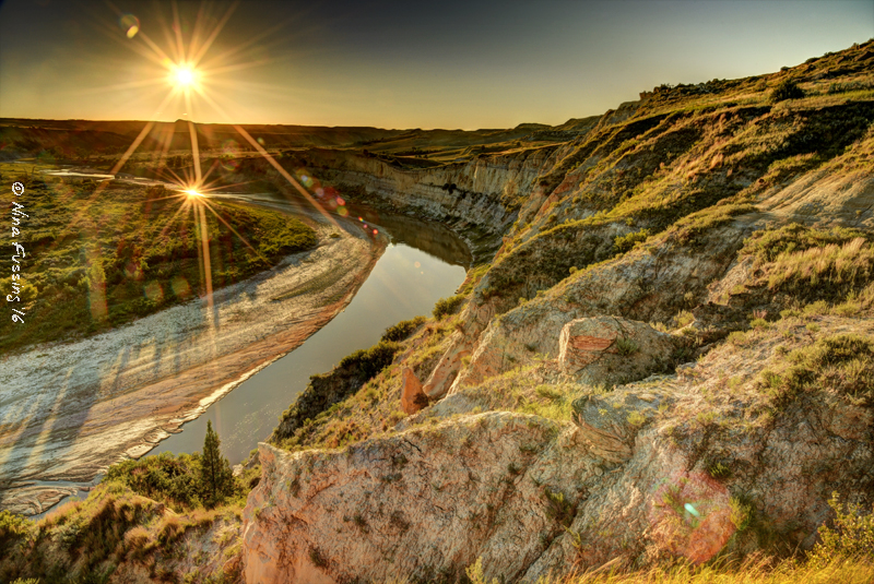 Double sun flare at Wind Canyon Overlook. A pretty amazing sight.