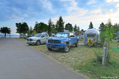 View down row 9 towards front by the water. Site 1207 on right.