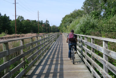 Riding the lovely bike trail to town just next to camp.