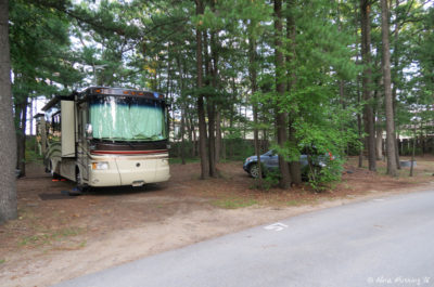 View of our site 57. It seemed large enough online, but all the trees made it tricky to get into. Plus it was very soft and we needed several layers of blocks so we wouldn't sink in.