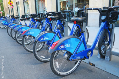 A line of Citibikes at a docking station