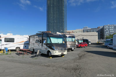 View down first middle row of RV Park. Front RV in site A02 with A04/A06 to right