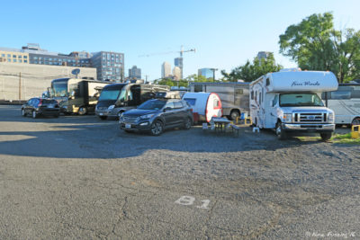 View down B row. RV in site B01 on right with B03/B05 on left