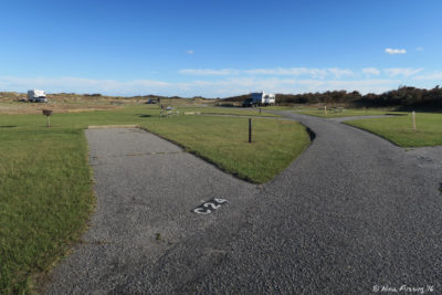 View further down C Loop. Site C24 on left. RV in site C29 in far back right.