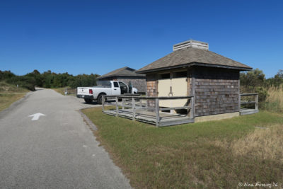 View of shower facilities (front) and toilets (back)