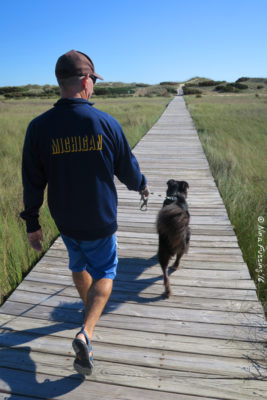 Walking the boardwalk towards the beach at Frisco Campground